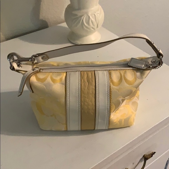 small yellow coach purse